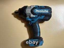 Makita XWT08 18-Volt 1/2-Inch Cordless Impact Driver withCharger & Battery